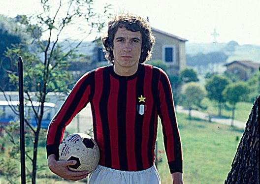 Italian singer-songwriter Rino Gaetano (Salvatore Antonio Gaetano) posing with a football and the AC Milan's new shirt (team of which he is a fan) with the star and the shield applied after the conquest of the 10th Italian title. Photo shoot. Italy, June 1979 ( Photo by Rino Petrosino/Mondadori via Getty Images) Italian singer-songwriter Rino Gaetano (Salvatore Antonio Gaetano) posing with a football and the AC Milan's new shirt (team of which he is a fan) with the star and the shield applied after the conquest of the 10th Italian title. Photo shoot. Italy, June 1979 ( Photo by Rino Petrosino/Mondadori via Getty Images)