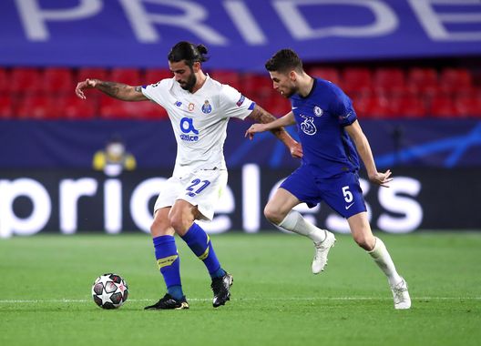 SEVILLE, SPAIN - APRIL 13: Sergio Oliveira of Porto and Jorginho of Chelsea battle for the ball during the UEFA Champions League Quarter Final Second Leg match between Chelsea FC and FC Porto at Estadio Ramon Sanchez Pizjuan on April 13, 2021 in Seville, Spain. Sporting stadiums around Spain remain under strict restrictions due to the Coronavirus Pandemic as Government social distancing laws prohibit fans inside venues resulting in games being played behind closed doors. (Photo by Fran Santiago/Getty Images) SEVILLE, SPAIN - APRIL 13: Sergio Oliveira of Porto and Jorginho of Chelsea battle for the ball during the UEFA Champions League Quarter Final Second Leg match between Chelsea FC and FC Porto at Estadio Ramon Sanchez Pizjuan on April 13, 2021 in Seville, Spain. Sporting stadiums around Spain remain under strict restrictions due to the Coronavirus Pandemic as Government social distancing laws prohibit fans inside venues resulting in games being played behind closed doors. (Photo by Fran Santiago/Getty Images)