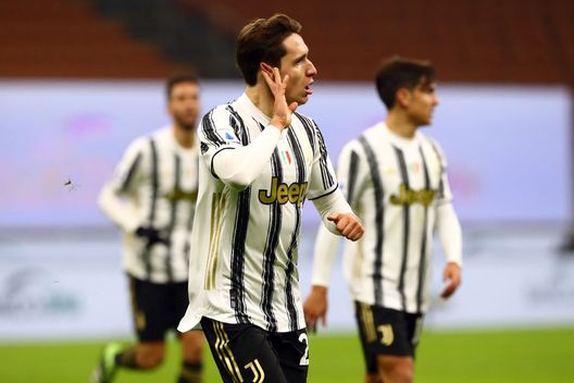 MILAN, ITALY - JANUARY 06: Federico Chiesa of Juventus F.C. celebrates after scoring their team's second goal during the Serie A match between AC Milan and Juventus at Stadio Giuseppe Meazza on January 06, 2021 in Milan, Italy. Sporting stadiums around Italy remain under strict restrictions due to the Coronavirus Pandemic as Government social distancing laws prohibit fans inside venues resulting in games being played behind closed doors. (Photo by Marco Luzzani/Getty Images) MILAN, ITALY - JANUARY 06: Federico Chiesa of Juventus F.C. celebrates after scoring their team's second goal during the Serie A match between AC Milan and Juventus at Stadio Giuseppe Meazza on January 06, 2021 in Milan, Italy. Sporting stadiums around Italy remain under strict restrictions due to the Coronavirus Pandemic as Government social distancing laws prohibit fans inside venues resulting in games being played behind closed doors. (Photo by Marco Luzzani/Getty Images)