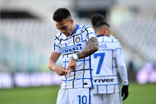 TURIN, ITALY - MARCH 14: Lautaro Martinez of Internazionale celebrates after scoring their side's second goal during the Serie A match between Torino FC and FC Internazionale at Stadio Olimpico di Torino on March 14, 2021 in Turin, Italy. Sporting stadiums around Italy remain under strict restrictions due to the Coronavirus Pandemic as Government social distancing laws prohibit fans inside venues resulting in games being played behind closed doors. (Photo by Valerio Pennicino/Getty Images) TURIN, ITALY - MARCH 14: Lautaro Martinez of Internazionale celebrates after scoring their side's second goal during the Serie A match between Torino FC and FC Internazionale at Stadio Olimpico di Torino on March 14, 2021 in Turin, Italy. Sporting stadiums around Italy remain under strict restrictions due to the Coronavirus Pandemic as Government social distancing laws prohibit fans inside venues resulting in games being played behind closed doors. (Photo by Valerio Pennicino/Getty Images)