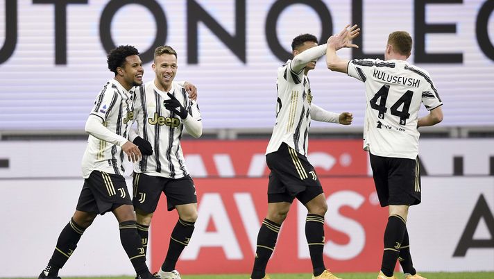 MILAN, ITALY - JANUARY 06: Weston McKennie of Juventus celebrates after scoring his team's third goal with teammates Arthur Melo, Danilo and Dejan Kulusevski during the Serie A match between AC Milan and Juventus at Stadio Giuseppe Meazza on January 06, 2021 in Milan, Italy. Sporting stadiums around Italy remain under strict restrictions due to the Coronavirus Pandemic as Government social distancing laws prohibit fans inside venues resulting in games being played behind closed doors. (Photo by Daniele Badolato - Juventus FC/Juventus FC via Getty Images) MILAN, ITALY - JANUARY 06: Weston McKennie of Juventus celebrates after scoring his team's third goal with teammates Arthur Melo, Danilo and Dejan Kulusevski during the Serie A match between AC Milan and Juventus at Stadio Giuseppe Meazza on January 06, 2021 in Milan, Italy. Sporting stadiums around Italy remain under strict restrictions due to the Coronavirus Pandemic as Government social distancing laws prohibit fans inside venues resulting in games being played behind closed doors. (Photo by Daniele Badolato - Juventus FC/Juventus FC via Getty Images)