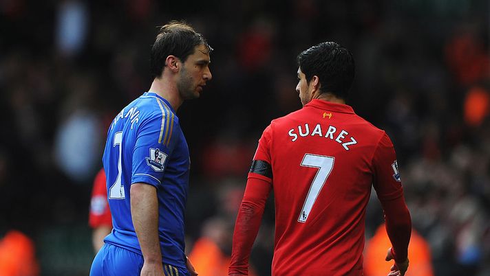 LIVERPOOL, ENGLAND - APRIL 21: Branislav Ivanovic of Chelsea talks with Luis Suarez of Liverpool as they walk in for half time during the Barclays Premier League match between Liverpool and Chelsea at Anfield on April 21, 2013 in Liverpool, England. (Photo by Michael Regan/Getty Images) LIVERPOOL, ENGLAND - APRIL 21: Branislav Ivanovic of Chelsea talks with Luis Suarez of Liverpool as they walk in for half time during the Barclays Premier League match between Liverpool and Chelsea at Anfield on April 21, 2013 in Liverpool, England. (Photo by Michael Regan/Getty Images)