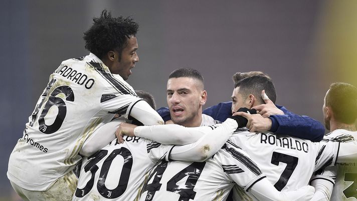 MILAN, ITALY - FEBRUARY 02: Cristiano Ronaldo of Juventus celebrates after scoring his team's second goal with teammates Juan Cuadrado, Rodrigo Bentancur and Merih Demiral during the Coppa Italia semi-final match between FC Internazionale and Juventus at Stadio Giuseppe Meazza on February 02, 2021 in Milan, Italy. Sporting stadiums around Italy remain under strict restrictions due to the Coronavirus Pandemic as Government social distancing laws prohibit fans inside venues resulting in games being played behind closed doors. (Photo by Daniele Badolato - Juventus FC/Juventus FC via Getty Images ) MILAN, ITALY - FEBRUARY 02: Cristiano Ronaldo of Juventus celebrates after scoring his team's second goal with teammates Juan Cuadrado, Rodrigo Bentancur and Merih Demiral during the Coppa Italia semi-final match between FC Internazionale and Juventus at Stadio Giuseppe Meazza on February 02, 2021 in Milan, Italy. Sporting stadiums around Italy remain under strict restrictions due to the Coronavirus Pandemic as Government social distancing laws prohibit fans inside venues resulting in games being played behind closed doors. (Photo by Daniele Badolato - Juventus FC/Juventus FC via Getty Images )