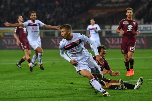 TURIN, ITALY - OCTOBER 29: Nicolo Barella of Cagliari Calcio celebrates after scoring the opening goal during the Serie A match between Torino FC and Cagliari Calcio at Stadio Olimpico di Torino on October 29, 2017 in Turin, Italy. (Photo by Valerio Pennicino/Getty Images) TURIN, ITALY - OCTOBER 29: Nicolo Barella of Cagliari Calcio celebrates after scoring the opening goal during the Serie A match between Torino FC and Cagliari Calcio at Stadio Olimpico di Torino on October 29, 2017 in Turin, Italy. (Photo by Valerio Pennicino/Getty Images)