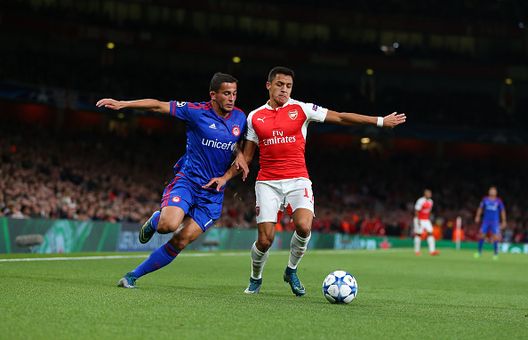 LONDON, ENGLAND - SEPTEMBER 29: Omar El Abdellaoui of Olympiacos and Alexis Sanchez of Arsenal during the UEFA Champions League match between Arsenal and Olympiacos at the Emirates Stadium on September 29, 2015 in London, United Kingdom. (Photo by Catherine Ivill - AMA/Getty Images) LONDON, ENGLAND - SEPTEMBER 29: Omar El Abdellaoui of Olympiacos and Alexis Sanchez of Arsenal during the UEFA Champions League match between Arsenal and Olympiacos at the Emirates Stadium on September 29, 2015 in London, United Kingdom. (Photo by Catherine Ivill - AMA/Getty Images)