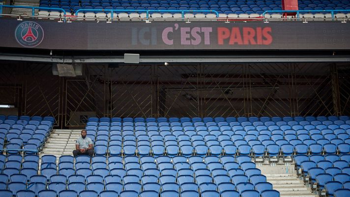 PARIS, FRANCE - AUGUST 23: A Paris Saint Germain staff member sits alone in PSG's Parc des Princes Stadium ahead of the Champions League Final on August 23, 2020 in Paris, France. Paris Saint German football team have reached the 2019/20 UEFA Champions League finals for the first time in their history, just eleven days after celebrating their 50th Anniversary, and take on five-time winners Bayern Munich at the Estádio da Luz in Lisbon. (Photo by Kiran Ridley/Getty Images) PARIS, FRANCE - AUGUST 23: A Paris Saint Germain staff member sits alone in PSG's Parc des Princes Stadium ahead of the Champions League Final on August 23, 2020 in Paris, France. Paris Saint German football team have reached the 2019/20 UEFA Champions League finals for the first time in their history, just eleven days after celebrating their 50th Anniversary, and take on five-time winners Bayern Munich at the Estádio da Luz in Lisbon. (Photo by Kiran Ridley/Getty Images)