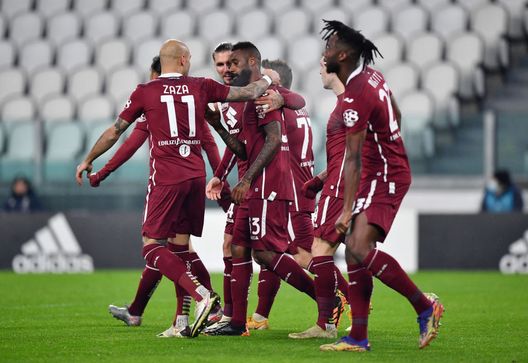 TURIN, ITALY - DECEMBER 05: Nkoulou Nicolas of Torino FC celebrates with teammates Lyanco Vojnovic and Zaza Simone after scoring his team's first goal after scoring his team's first goal during the Serie A match between Juventus and Torino FC at Allianz Stadium on December 05, 2020 in Turin, Italy. Football Stadiums around Italy remain empty due to the Coronavirus Pandemic as Government social distancing laws prohibit fans inside venues resulting in fixtures being played behind closed doors. (Photo by Valerio Pennicino/Getty Images) TURIN, ITALY - DECEMBER 05: Nkoulou Nicolas of Torino FC celebrates with teammates Lyanco Vojnovic and Zaza Simone after scoring his team's first goal after scoring his team's first goal during the Serie A match between Juventus and Torino FC at Allianz Stadium on December 05, 2020 in Turin, Italy. Football Stadiums around Italy remain empty due to the Coronavirus Pandemic as Government social distancing laws prohibit fans inside venues resulting in fixtures being played behind closed doors. (Photo by Valerio Pennicino/Getty Images)