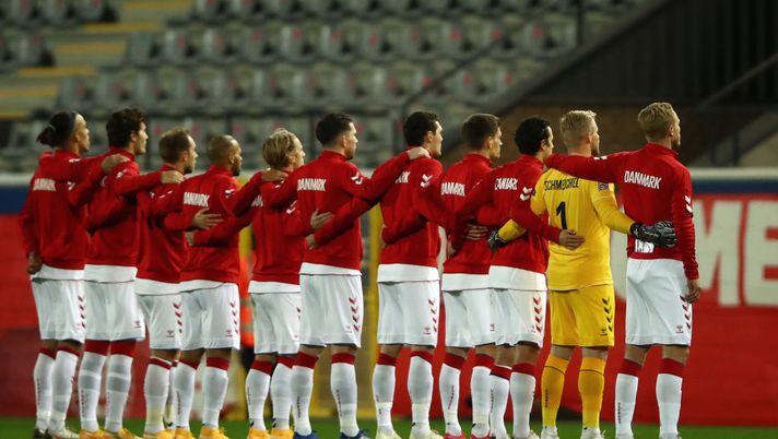 HEVERLEE, BELGIUM - NOVEMBER 18: The Denmark team line up during the national anthems prior to the UEFA Nations League group stage match between Belgium and Denmark at King Power at Den Dreef Stadion on November 18, 2020 in Heverlee, Belgium. Football Stadiums around Europe remain empty due to the Coronavirus Pandemic as Government social distancing laws prohibit fans inside venues resulting in fixtures being played behind closed doors. (Photo by Dean Mouhtaropoulos/Getty Images) HEVERLEE, BELGIUM - NOVEMBER 18: The Denmark team line up during the national anthems prior to the UEFA Nations League group stage match between Belgium and Denmark at King Power at Den Dreef Stadion on November 18, 2020 in Heverlee, Belgium. Football Stadiums around Europe remain empty due to the Coronavirus Pandemic as Government social distancing laws prohibit fans inside venues resulting in fixtures being played behind closed doors. (Photo by Dean Mouhtaropoulos/Getty Images)