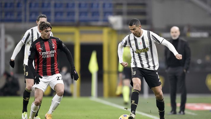 MILAN, ITALY - JANUARY 06: Cristiano Ronaldo of Juventus controls the ball with Daniel Maldini of AC Milan during the Serie A match between AC Milan and Juventus at Stadio Giuseppe Meazza on January 06, 2021 in Milan, Italy. Sporting stadiums around Italy remain under strict restrictions due to the coronavirus pandemic as government social distancing laws prohibit fans inside venues resulting in games being played behind closed doors. (Photo by Daniele Badolato - Juventus FC/Juventus FC via Getty Images) D. Maldini: “Vorrei che tutti vedessero ciò che so fare. Su Leao…” - immagine 1