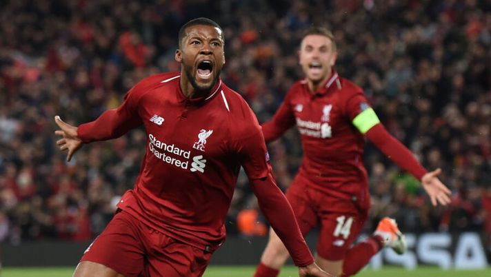 Liverpool's Dutch midfielder Georginio Wijnaldum celebrates after scoring their third goal during the UEFA Champions league semi-final second leg football match between Liverpool and Barcelona at Anfield in Liverpool, north west England on May 7, 2019. (Photo by Paul ELLIS / AFP)        (Photo credit should read PAUL ELLIS/AFP/Getty Images)  Wijnaldum, la Roma chiude e ha inviato i documenti: affare ai dettagli finali - immagine 1
