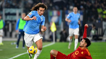 ROME, ITALY - JANUARY 10: Matteo Guendouzi of SS Lazio compete for the ball with Leandro Paredes of AS Roma during the Coppa Italia match between SS Lazio and AS Roma at Stadio Olimpico on January 10, 2024 in Rome, Italy. (Photo by Marco Rosi - SS Lazio/Getty Images)