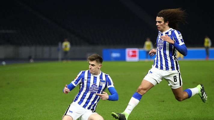 BERLIN, GERMANY - DECEMBER 04: Krzysztof Piatek of Hertha celebrates his team's second goal with teammate Matteo Guendouzi during the Bundesliga match between Hertha BSC and 1. FC Union Berlin at Olympiastadion on December 04, 2020 in Berlin, Germany. Sporting stadiums around Germany remain under strict restrictions due to the Coronavirus Pandemic as Government social distancing laws prohibit fans inside venues resulting in games being played behind closed doors. (Photo by Maja Hitij/Getty Images) BERLIN, GERMANY - DECEMBER 04: Krzysztof Piatek of Hertha celebrates his team's second goal with teammate Matteo Guendouzi during the Bundesliga match between Hertha BSC and 1. FC Union Berlin at Olympiastadion on December 04, 2020 in Berlin, Germany. Sporting stadiums around Germany remain under strict restrictions due to the Coronavirus Pandemic as Government social distancing laws prohibit fans inside venues resulting in games being played behind closed doors. (Photo by Maja Hitij/Getty Images)