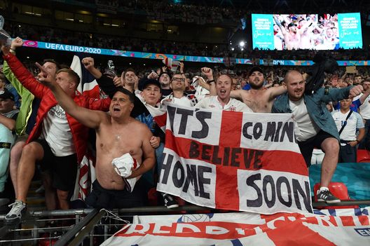 LONDON, ENGLAND - JULY 07: Fans of England celebrate their side's victory after the UEFA Euro 2020 Championship Semi-final match between England and Denmark at Wembley Stadium on July 07, 2021 in London, England. (Photo by Paul Ellis - Pool/Getty Images) LONDON, ENGLAND - JULY 07: Fans of England celebrate their side's victory after the UEFA Euro 2020 Championship Semi-final match between England and Denmark at Wembley Stadium on July 07, 2021 in London, England. (Photo by Paul Ellis - Pool/Getty Images)