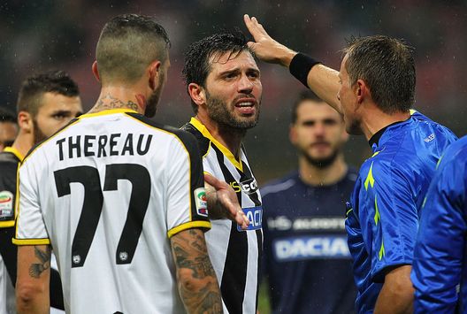 MILAN, ITALY - NOVEMBER 30: Maurizio Domizzi (C) of Udinese Calcio receives the red card from referee Paolo Valeri during the Serie A match between AC Milan and Udinese Calcio at Stadio Giuseppe Meazza on November 30, 2014 in Milan, Italy. (Photo by Marco Luzzani/Getty Images) MILAN, ITALY - NOVEMBER 30: Maurizio Domizzi (C) of Udinese Calcio receives the red card from referee Paolo Valeri during the Serie A match between AC Milan and Udinese Calcio at Stadio Giuseppe Meazza on November 30, 2014 in Milan, Italy. (Photo by Marco Luzzani/Getty Images)