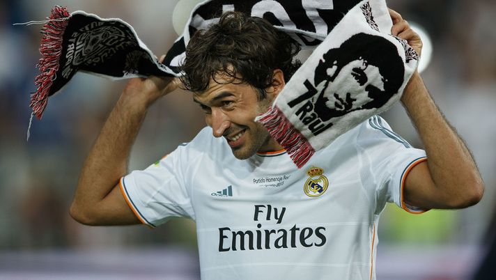 MADRID, SPAIN - AUGUST 22:  Former Real Madrid player Raul, donning a towel bearing his likeness, acknowledges the crowd after the Santiago Bernabeu Trophy match between Real Madrid CF and Al-Sadd at Estadio Santiago Bernabeu on August 22, 2013 in Madrid, Spain.  (Photo by Gonzalo Arroyo Moreno/Getty Images) 