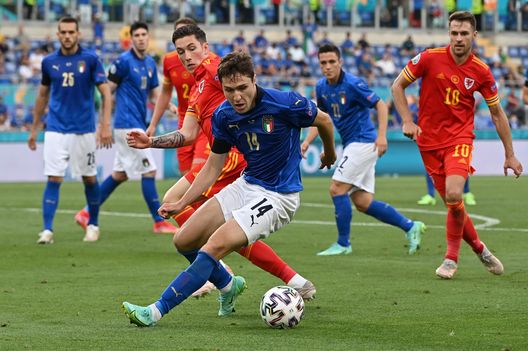ROME, ITALY - JUNE 20: Federico Chiesa of Italy battles for possession with Harry Wilson of Wales during the UEFA Euro 2020 Championship Group A match between Italy and Wales at Olimpico Stadium on June 20, 2021 in Rome, Italy. (Photo by Andreas Solaro - Pool/Getty Images) ROME, ITALY - JUNE 20: Federico Chiesa of Italy battles for possession with Harry Wilson of Wales during the UEFA Euro 2020 Championship Group A match between Italy and Wales at Olimpico Stadium on June 20, 2021 in Rome, Italy. (Photo by Andreas Solaro - Pool/Getty Images)