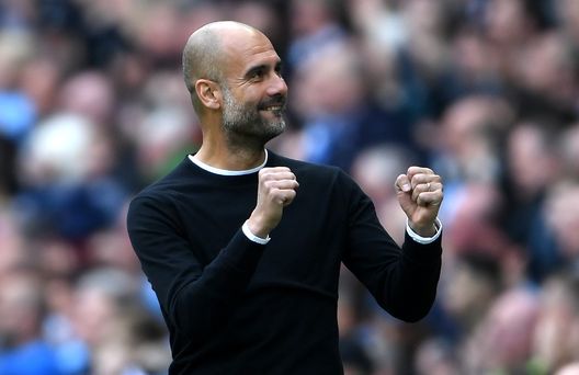 MANCHESTER, ENGLAND - APRIL 22:  Josep Guardiola, Manager of Manchester City celebrates his side's second goal during the Premier League match between Manchester City and Swansea City at Etihad Stadium on April 22, 2018 in Manchester, England.  (Photo by Laurence Griffiths/Getty Images) 