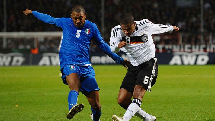 OSNABRUECK, GERMANY - NOVEMBER 18: Fabiano Santacroce (L) of Italy and Chinedu Ede of Germany fight for the ball during the men's U21 international friendly match between Germany and Italy at the osnatel Arena on November 18, 2008 in Osnabrueck, Germany. (Photo by Thomas Starke/Bongarts/Getty Images for DFB) OSNABRUECK, GERMANY - NOVEMBER 18: Fabiano Santacroce (L) of Italy and Chinedu Ede of Germany fight for the ball during the men's U21 international friendly match between Germany and Italy at the osnatel Arena on November 18, 2008 in Osnabrueck, Germany. (Photo by Thomas Starke/Bongarts/Getty Images for DFB)