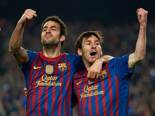 Messi Fabregas (getty images) Messi Fabregas (getty images)