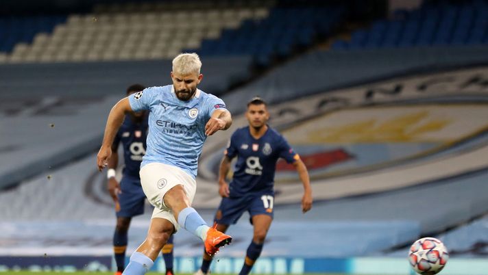 MANCHESTER, ENGLAND - OCTOBER 21: Sergio Aguero of Manchester City scores his team's first goal from the penalty spot during the UEFA Champions League Group C stage match between Manchester City and FC Porto at Etihad Stadium on October 21, 2020 in Manchester, England. Sporting stadiums around the UK remain under strict restrictions due to the Coronavirus Pandemic as Government social distancing laws prohibit fans inside venues resulting in games being played behind closed doors. (Photo by Martin Rickett - Pool/Getty Images) MANCHESTER, ENGLAND - OCTOBER 21: Sergio Aguero of Manchester City scores his team's first goal from the penalty spot during the UEFA Champions League Group C stage match between Manchester City and FC Porto at Etihad Stadium on October 21, 2020 in Manchester, England. Sporting stadiums around the UK remain under strict restrictions due to the Coronavirus Pandemic as Government social distancing laws prohibit fans inside venues resulting in games being played behind closed doors. (Photo by Martin Rickett - Pool/Getty Images)