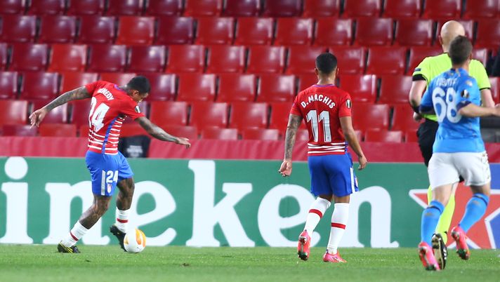GRANADA, SPAIN - FEBRUARY 18: Kenedy of Granada CF scores their sides second goal during the UEFA Europa League Round of 32 match between Granada CF and SSC Napoli at Nuevo Estadio Los Carmenes on February 18, 2021 in Granada, Spain. Sporting stadiums around Spain remain under strict restrictions due to the Coronavirus Pandemic as Government social distancing laws prohibit fans inside venues resulting in games being played behind closed doors. (Photo by Fran Santiago/Getty Images) GRANADA, SPAIN - FEBRUARY 18: Kenedy of Granada CF scores their sides second goal during the UEFA Europa League Round of 32 match between Granada CF and SSC Napoli at Nuevo Estadio Los Carmenes on February 18, 2021 in Granada, Spain. Sporting stadiums around Spain remain under strict restrictions due to the Coronavirus Pandemic as Government social distancing laws prohibit fans inside venues resulting in games being played behind closed doors. (Photo by Fran Santiago/Getty Images)