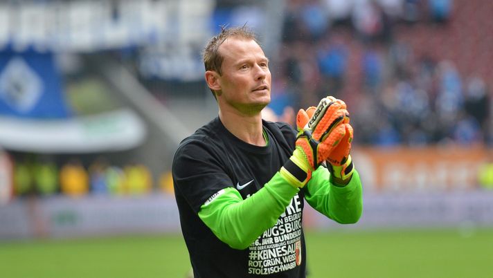 AUGSBURG, GERMANY - MAY 14: Alexander Manninger, goalkeeper of Augsburg celebrates with the fans after the Bundesliga match between FC Augsburg and Hamburger SV at SGL Arena on May 14, 2016 in Augsburg, Germany. (Photo by Micha Will/Bongarts/Getty Images) AUGSBURG, GERMANY - MAY 14: Alexander Manninger, goalkeeper of Augsburg celebrates with the fans after the Bundesliga match between FC Augsburg and Hamburger SV at SGL Arena on May 14, 2016 in Augsburg, Germany. (Photo by Micha Will/Bongarts/Getty Images)