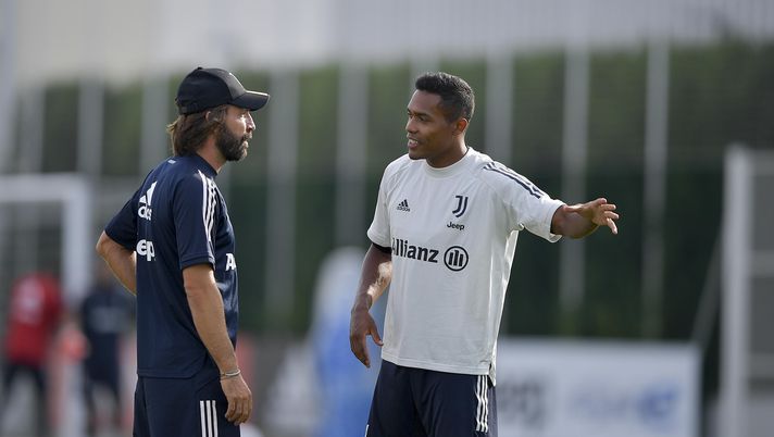 TURIN, ITALY - SEPTEMBER 09: Juventus coach Andrea Pirlo with player Alex Sandro during a training session at JTC on September 09, 2020 in Turin, Italy. (Photo by Daniele Badolato - Juventus FC/Juventus FC via Getty Images) TURIN, ITALY - SEPTEMBER 09: Juventus coach Andrea Pirlo with player Alex Sandro during a training session at JTC on September 09, 2020 in Turin, Italy. (Photo by Daniele Badolato - Juventus FC/Juventus FC via Getty Images)