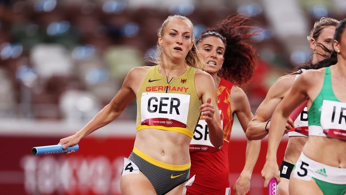 TOKYO, JAPAN - JULY 30: Alica Schmidt of Team Germany competes in the 4x400 Relay Mixed Round 1 on day seven of the Tokyo 2020 Olympic Games at Olympic Stadium on July 30, 2021 in Tokyo, Japan. (Photo by David Ramos/Getty Images) 
