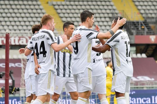 TURIN, ITALY - APRIL 03: Federico Chiesa of Juventus celebrates with teammates after scoring his team's first goal during the Serie A match between Torino FC and Juventus at Stadio Olimpico di Torino on April 03, 2021 in Turin, Italy. Sporting stadiums around Italy remain under strict restrictions due to the Coronavirus Pandemic as Government social distancing laws prohibit fans inside venues resulting in games being played behind closed doors. (Photo by Daniele Badolato - Juventus FC/Juventus FC via Getty Images) TURIN, ITALY - APRIL 03: Federico Chiesa of Juventus celebrates with teammates after scoring his team's first goal during the Serie A match between Torino FC and Juventus at Stadio Olimpico di Torino on April 03, 2021 in Turin, Italy. Sporting stadiums around Italy remain under strict restrictions due to the Coronavirus Pandemic as Government social distancing laws prohibit fans inside venues resulting in games being played behind closed doors. (Photo by Daniele Badolato - Juventus FC/Juventus FC via Getty Images)