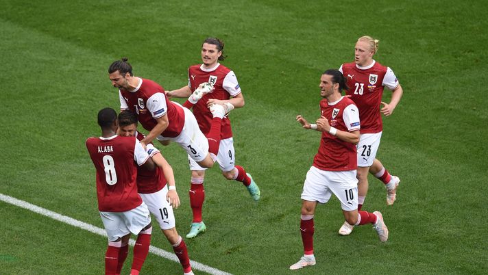 BUCHAREST, ROMANIA - JUNE 21: Christoph Baumgartner of Austria celebrates with David Alaba and Aleksandar Dragovic after scoring their side's first goal during the UEFA Euro 2020 Championship Group C match between Ukraine and Austria at National Arena on June 21, 2021 in Bucharest, Romania. (Photo by Mihai Barbu - Pool/Getty Images) BUCHAREST, ROMANIA - JUNE 21: Christoph Baumgartner of Austria celebrates with David Alaba and Aleksandar Dragovic after scoring their side's first goal during the UEFA Euro 2020 Championship Group C match between Ukraine and Austria at National Arena on June 21, 2021 in Bucharest, Romania. (Photo by Mihai Barbu - Pool/Getty Images)