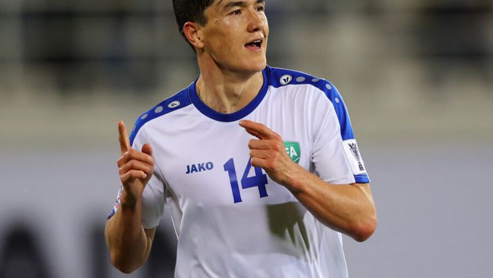 AL AIN, UNITED ARAB EMIRATES - JANUARY 17: Eldor Shomurodov of Uzbekistan celebrates as he scores his team's first goal during the AFC Asian Cup Group F match between Japan and Uzbekistsn at Khalifa Bin Zayed Stadium on January 17, 2019 in Al Ain, United Arab Emirates. (Photo by Francois Nel/Getty Images) Shomurodov manda un segnale a Mourinho: gol in amichevole contro la Svezia - immagine 1