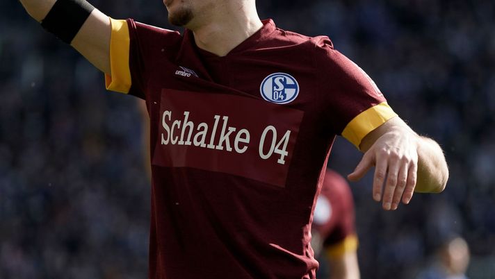 KARLSRUHE, GERMANY - FEBRUARY 26: A detailed view of a plain FC Schalke 04 shirt after the club removed the logo of its main sponsor GAZPROM from its jerseys in view of the recent events in the Ukraine during the Second Bundesliga match between Karlsruher SC and FC Schalke 04 at BBBank Wildpark on February 26, 2022 in Karlsruhe, Germany. Schalke has decided to remove the logo of its main sponsor GAZPROM from its jerseys in view of the recent events in the Ukraine. Instead the lettering 'Schalke 04' will appear on the players chest. (Photo by Thomas Niedermueller/Getty Images) KARLSRUHE, GERMANY - FEBRUARY 26: A detailed view of a plain FC Schalke 04 shirt after the club removed the logo of its main sponsor GAZPROM from its jerseys in view of the recent events in the Ukraine during the Second Bundesliga match between Karlsruher SC and FC Schalke 04 at BBBank Wildpark on February 26, 2022 in Karlsruhe, Germany. Schalke has decided to remove the logo of its main sponsor GAZPROM from its jerseys in view of the recent events in the Ukraine. Instead the lettering 'Schalke 04' will appear on the players chest. (Photo by Thomas Niedermueller/Getty Images)
