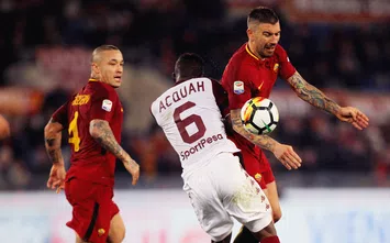  ROME, ITALY - MARCH 09: Aleksandar Kolarov of AS Roma competes for the ball with Afryie Acquah of Torino FC during the Serie A match between AS Roma and Torino FC at Stadio Olimpico on March 9, 2018 in Rome, Italy. (Photo by Paolo Bruno/Getty Images)