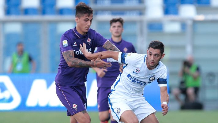 REGGIO NELL'EMILIA, ITALY - JUNE 11: Andrea Cagnano of FC Internazionale Milano (R) competes for the ball with Julian Illanes Minucci of ACF Fiorentina during the Primavera TIM Playoffs match between FC Internazionale and ACF Fiorentina on June 11, 2017 in Reggio nell'Emilia, Italy. (Photo by Emilio Andreoli - Inter/FC Internazionale via Getty Images) REGGIO NELL'EMILIA, ITALY - JUNE 11: Andrea Cagnano of FC Internazionale Milano (R) competes for the ball with Julian Illanes Minucci of ACF Fiorentina during the Primavera TIM Playoffs match between FC Internazionale and ACF Fiorentina on June 11, 2017 in Reggio nell'Emilia, Italy. (Photo by Emilio Andreoli - Inter/FC Internazionale via Getty Images)