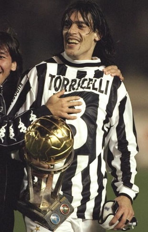 26 Nov 1996: Moreno Torricelli of Juventus celebrates with the Toyota cup after his teams win over River Plate by 1-0. 26 Nov 1996: Moreno Torricelli of Juventus celebrates with the Toyota cup after his teams win over River Plate by 1-0.