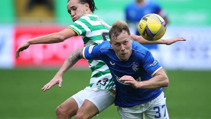 GLASGOW, SCOTLAND - OCTOBER 17: Scott Arfield of Rangers is challenged by Diego Laxalt of Celtic during the Ladbrokes Scottish Premiership match between Celtic and Rangers at Celtic Park on October 17, 2020 in Glasgow, Scotland. Sporting stadiums around the UK remain under strict restrictions due to the Coronavirus Pandemic as Government social distancing laws prohibit fans inside venues resulting in games being played behind closed doors. (Photo by Ian MacNicol/Getty Images) GLASGOW, SCOTLAND - OCTOBER 17: Scott Arfield of Rangers is challenged by Diego Laxalt of Celtic during the Ladbrokes Scottish Premiership match between Celtic and Rangers at Celtic Park on October 17, 2020 in Glasgow, Scotland. Sporting stadiums around the UK remain under strict restrictions due to the Coronavirus Pandemic as Government social distancing laws prohibit fans inside venues resulting in games being played behind closed doors. (Photo by Ian MacNicol/Getty Images)