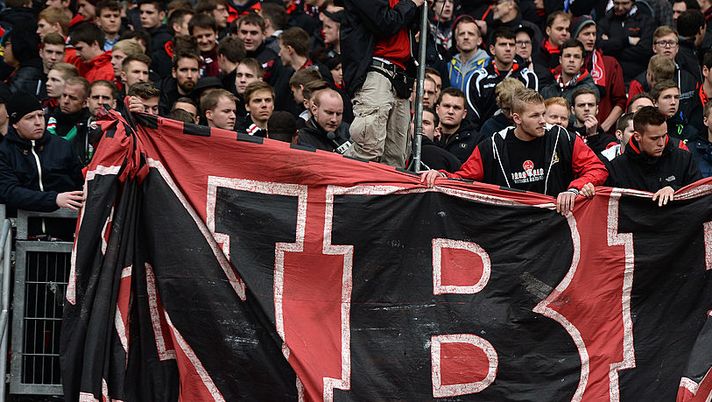 NUREMBERG, GERMANY - MAY 03: Nuernbergs fan group Ultras pack up their banners 30 minutes before the end of the Bundesliga match between 1. FC Nuernberg and Hannover 96 at Grundig Stadium on May 3, 2014 in Nuremberg, Germany.  (Photo by Micha Will/Bongarts/Getty Images) 