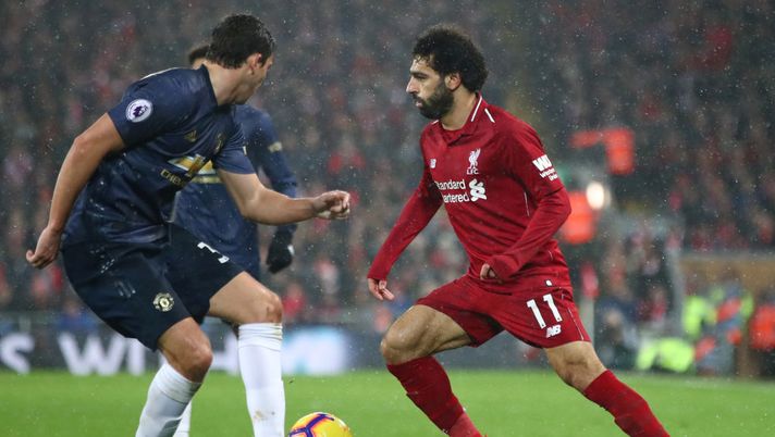 LIVERPOOL, ENGLAND - DECEMBER 16: Mohamed Salah of Liverpool is challanged by Matteo Darmian of Manchester United during the Premier League match between Liverpool FC and Manchester United at Anfield on December 16, 2018 in Liverpool, United Kingdom. (Photo by Clive Brunskill/Getty Images) LIVERPOOL, ENGLAND - DECEMBER 16: Mohamed Salah of Liverpool is challanged by Matteo Darmian of Manchester United during the Premier League match between Liverpool FC and Manchester United at Anfield on December 16, 2018 in Liverpool, United Kingdom. (Photo by Clive Brunskill/Getty Images)