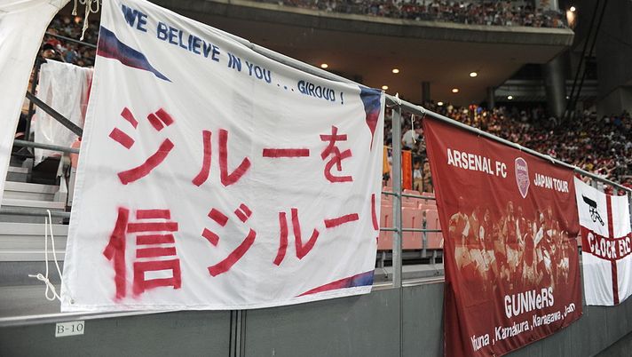 TOYOTA, JAPAN - JULY 22: Japanese fan's banner of Olivier Giroud during the pre-season friendly match between Nagoya Grampus and Arsenal at Toyota Stadium on July 22, 2013 in Toyota, Aichi, Japan. (Photo by Masashi Hara/Getty Images) TOYOTA, JAPAN - JULY 22: Japanese fan's banner of Olivier Giroud during the pre-season friendly match between Nagoya Grampus and Arsenal at Toyota Stadium on July 22, 2013 in Toyota, Aichi, Japan. (Photo by Masashi Hara/Getty Images)