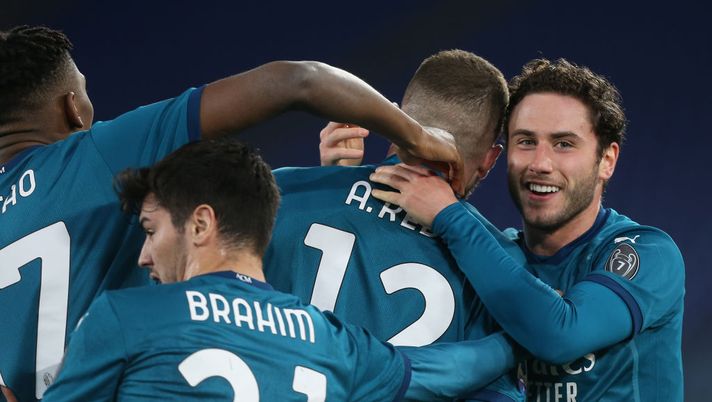 ROME, ITALY - FEBRUARY 28: Ante Rebic of AC Milan celebrates with Davide Calabria and team mates after scoring their side's second goal during the Serie A match between AS Roma and AC Milan at Stadio Olimpico on February 28, 2021 in Rome, Italy. Sporting stadiums around Italy remain under strict restrictions due to the Coronavirus Pandemic as Government social distancing laws prohibit fans inside venues resulting in games being played behind closed doors. (Photo by Paolo Bruno/Getty Images) ROME, ITALY - FEBRUARY 28: Ante Rebic of AC Milan celebrates with Davide Calabria and team mates after scoring their side's second goal during the Serie A match between AS Roma and AC Milan at Stadio Olimpico on February 28, 2021 in Rome, Italy. Sporting stadiums around Italy remain under strict restrictions due to the Coronavirus Pandemic as Government social distancing laws prohibit fans inside venues resulting in games being played behind closed doors. (Photo by Paolo Bruno/Getty Images)
