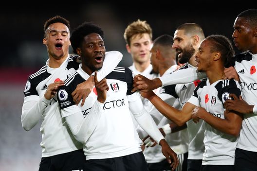 LONDON, ENGLAND - NOVEMBER 02: Ola Aina of Fulham celebrates with teammates after scoring his team's second goal during the Premier League match between Fulham and West Bromwich Albion at Craven Cottage on November 02, 2020 in London, England. Sporting stadiums around the UK remain under strict restrictions due to the Coronavirus Pandemic as Government social distancing laws prohibit fans inside venues resulting in games being played behind closed doors. (Photo by Clive Rose/Getty Images) LONDON, ENGLAND - NOVEMBER 02: Ola Aina of Fulham celebrates with teammates after scoring his team's second goal during the Premier League match between Fulham and West Bromwich Albion at Craven Cottage on November 02, 2020 in London, England. Sporting stadiums around the UK remain under strict restrictions due to the Coronavirus Pandemic as Government social distancing laws prohibit fans inside venues resulting in games being played behind closed doors. (Photo by Clive Rose/Getty Images)