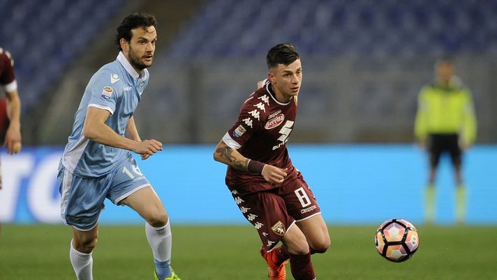 ROME, ITALY - MARCH 13:  Marco Parolo of SS Lazio compete for the ball with Daniele Baselli of FC Torino during the Serie A match between SS Lazio and FC Torino at Stadio Olimpico on March 13, 2017 in Rome, Italy.  (Photo by Marco Rosi/Getty Images) 