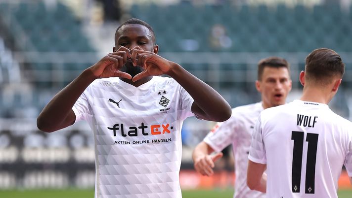 MOENCHENGLADBACH, GERMANY - APRIL 25: Marcus Thuram of Borussia Moenchengladbach celebrates after scoring their side's second goal during the Bundesliga match between Borussia Moenchengladbach and DSC Arminia Bielefeld at Borussia-Park on April 25, 2021 in Moenchengladbach, Germany. Sporting stadiums around Germany remain under strict restrictions due to the Coronavirus Pandemic as Government social distancing laws prohibit fans inside venues resulting in games being played behind closed doors. (Photo by Lars Baron/Getty Images) MOENCHENGLADBACH, GERMANY - APRIL 25: Marcus Thuram of Borussia Moenchengladbach celebrates after scoring their side's second goal during the Bundesliga match between Borussia Moenchengladbach and DSC Arminia Bielefeld at Borussia-Park on April 25, 2021 in Moenchengladbach, Germany. Sporting stadiums around Germany remain under strict restrictions due to the Coronavirus Pandemic as Government social distancing laws prohibit fans inside venues resulting in games being played behind closed doors. (Photo by Lars Baron/Getty Images)