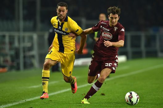 TURIN, ITALY - OCTOBER 29: Matteo Darmian (R) of Torino FC competes with Andrea Rispoli of Parma FC during the Serie A match between Torino FC and Parma FC at Stadio Olimpico di Torino on October 29, 2014 in Turin, Italy. (Photo by Valerio Pennicino/Getty Images) TURIN, ITALY - OCTOBER 29: Matteo Darmian (R) of Torino FC competes with Andrea Rispoli of Parma FC during the Serie A match between Torino FC and Parma FC at Stadio Olimpico di Torino on October 29, 2014 in Turin, Italy. (Photo by Valerio Pennicino/Getty Images)