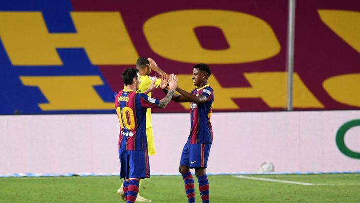 BARCELONA, SPAIN - SEPTEMBER 27: Lionel Messi and Ansu Fati of FC Barcelona celebrate their team's fourth goal during the La Liga Santander match between FC Barcelona and Villarreal CF at Camp Nou on September 27, 2020 in Barcelona, Spain. Football Stadiums around Europe remain empty due to the Coronavirus Pandemic as Government social distancing laws prohibit fans inside venues resulting in fixtures being played behind closed doors. (Photo by David Ramos/Getty Images) Ansu, stima infinita per Messi: “Dopo il debutto mi ha aspettato per abbracciarmi, non lo dimenticherò mai” - immagine 1