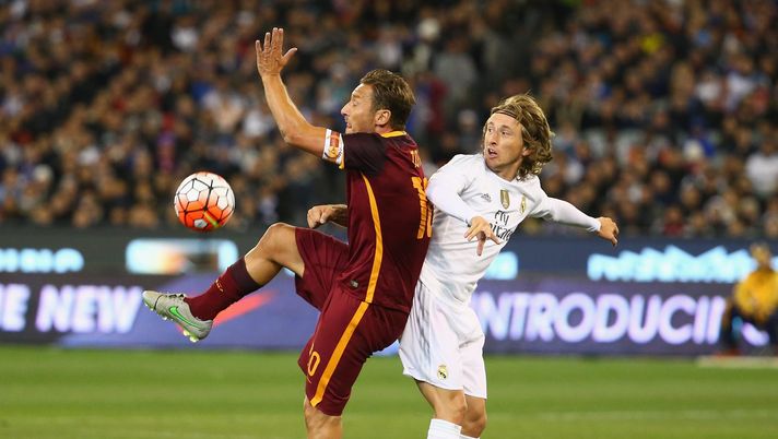 MELBOURNE, AUSTRALIA - JULY 18: Francesco Totti of AS Roma is challenged by Luca Modric of Real Madrid during the International Champions Cup friendly match between Real Madrid and AS Roma at the Melbourne Cricket Ground on July 18, 2015 in Melbourne, Australia. (Photo by Robert Cianflone/Getty Images) MELBOURNE, AUSTRALIA - JULY 18: Francesco Totti of AS Roma is challenged by Luca Modric of Real Madrid during the International Champions Cup friendly match between Real Madrid and AS Roma at the Melbourne Cricket Ground on July 18, 2015 in Melbourne, Australia. (Photo by Robert Cianflone/Getty Images)