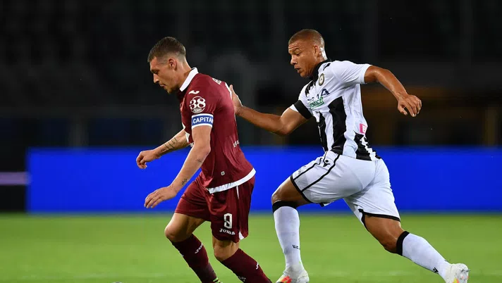 TURIN, ITALY - JUNE 23:  Andrea Belotti (L) of Torino FC is challenged by Sebastien De Maio of Udinese Calcio during the Serie A match between Torino FC and Udinese Calcio at Stadio Olimpico di Torino on June 23, 2020 in Turin, Italy.  (Photo by Valerio Pennicino/Getty Images)