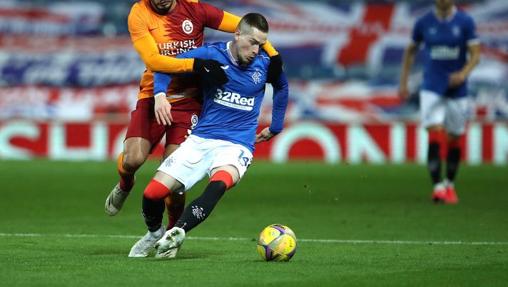 GLASGOW, SCOTLAND - OCTOBER 01: Ryan Kent of Rangers is challenged by Omar Elabdellaoui of Galatasaray during the UEFA Europa League play-off match between Rangers and Galatasaray at Ibrox Stadium on October 01, 2020 in Glasgow, Scotland. Football Stadiums around Europe remain empty due to the Coronavirus Pandemic as Government social distancing laws prohibit fans inside venues resulting in fixtures being played behind closed doors. (Photo by Ian MacNicol/Getty Images) GLASGOW, SCOTLAND - OCTOBER 01: Ryan Kent of Rangers is challenged by Omar Elabdellaoui of Galatasaray during the UEFA Europa League play-off match between Rangers and Galatasaray at Ibrox Stadium on October 01, 2020 in Glasgow, Scotland. Football Stadiums around Europe remain empty due to the Coronavirus Pandemic as Government social distancing laws prohibit fans inside venues resulting in fixtures being played behind closed doors. (Photo by Ian MacNicol/Getty Images)
