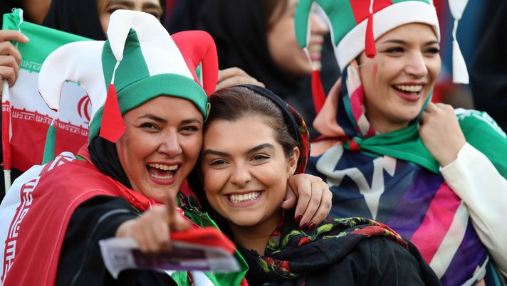 TEHRAN, IRAN - OCTOBER 10: Iranian Women's fans cheer during the FIFA World Cup Qualifier match between Iran and Cambodia at Azadi Stadium on October 10, 2019 in Tehran, Iran. (Photo by Amin M. Jamali/Getty Images) TEHRAN, IRAN - OCTOBER 10: Iranian Women's fans cheer during the FIFA World Cup Qualifier match between Iran and Cambodia at Azadi Stadium on October 10, 2019 in Tehran, Iran. (Photo by Amin M. Jamali/Getty Images)