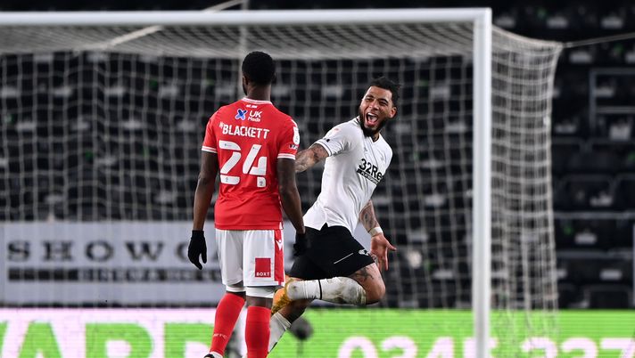 DERBY, ENGLAND - FEBRUARY 26: Colin Kazim-Roberts of Derby County celebrates his goal during the Sky Bet Championship match between Derby County and Nottingham Forest at Pride Park Stadium on February 26, 2021 in Derby, England. Sporting stadiums around the UK remain under strict restrictions due to the Coronavirus Pandemic as Government social distancing laws prohibit fans inside venues resulting in games being played behind closed doors. (Photo by Laurence Griffiths/Getty Images) DERBY, ENGLAND - FEBRUARY 26: Colin Kazim-Roberts of Derby County celebrates his goal during the Sky Bet Championship match between Derby County and Nottingham Forest at Pride Park Stadium on February 26, 2021 in Derby, England. Sporting stadiums around the UK remain under strict restrictions due to the Coronavirus Pandemic as Government social distancing laws prohibit fans inside venues resulting in games being played behind closed doors. (Photo by Laurence Griffiths/Getty Images)